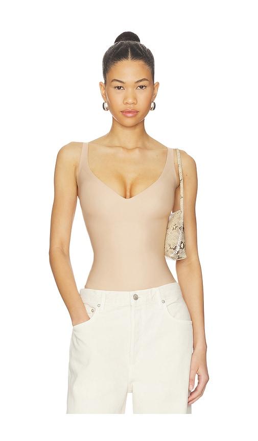 skims body core sculpt plunge thong bodysuit in nude.