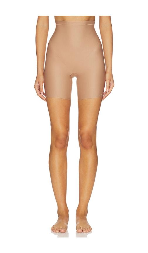 skims body cs mid rise short in taupe.