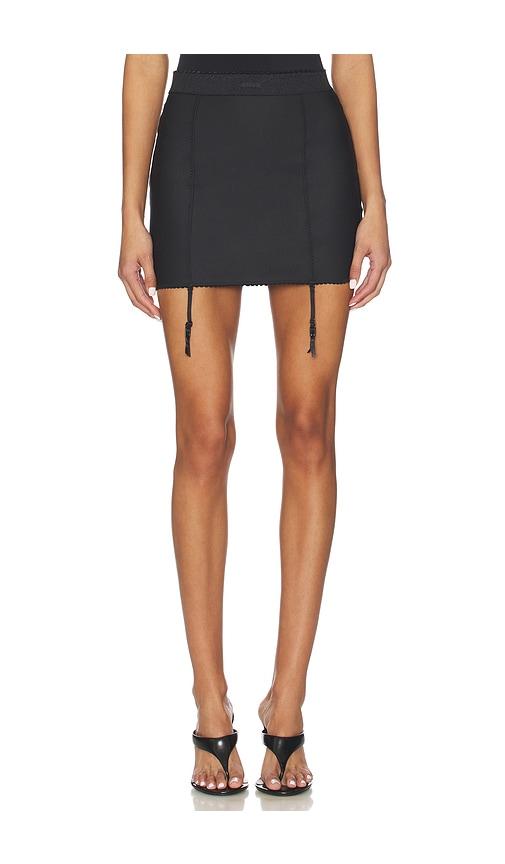 skims body mini garter skirt in black.