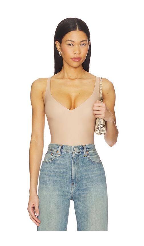 skims body plunge bodysuit in tan.
