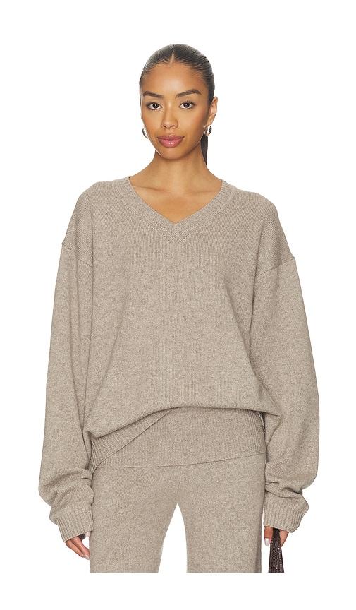 skims cashmere oversized boyfriend sweater in tan.
