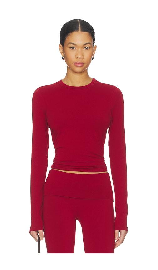 skims cotton jersey long sleeve t-shirt in red.