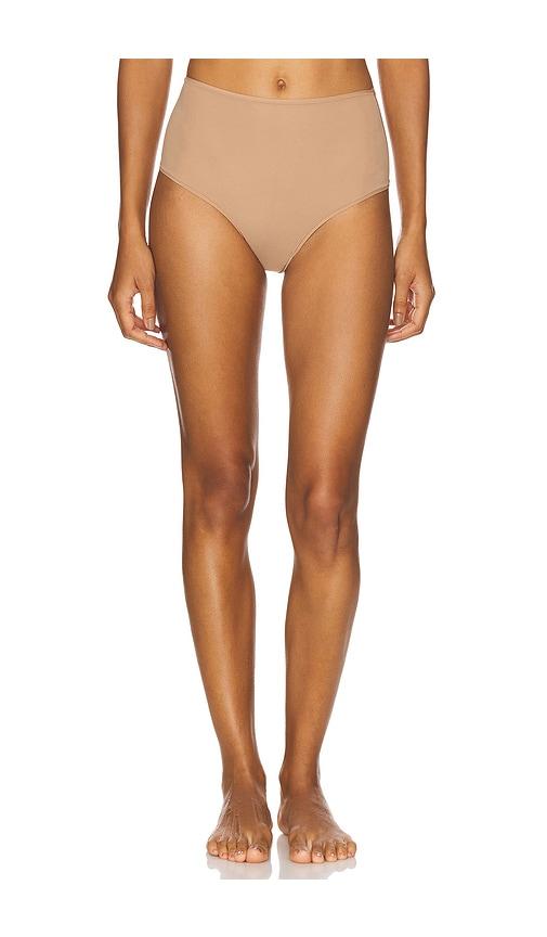 skims fits everybody high waisted thong in beige.