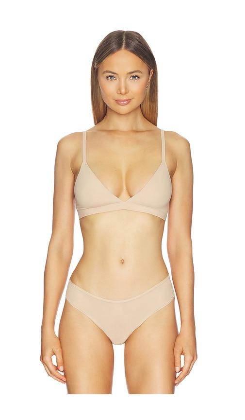 skims fits everybody triangle bralette in tan.