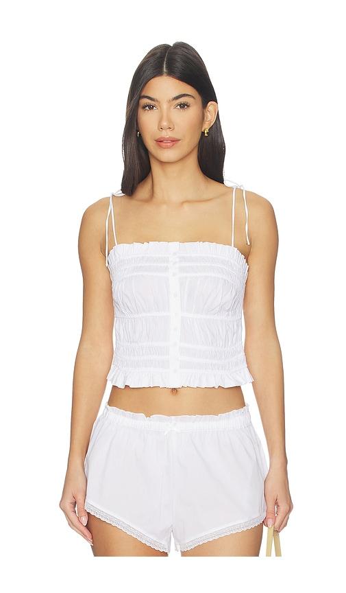 skims garment washed ruffle cami in white.