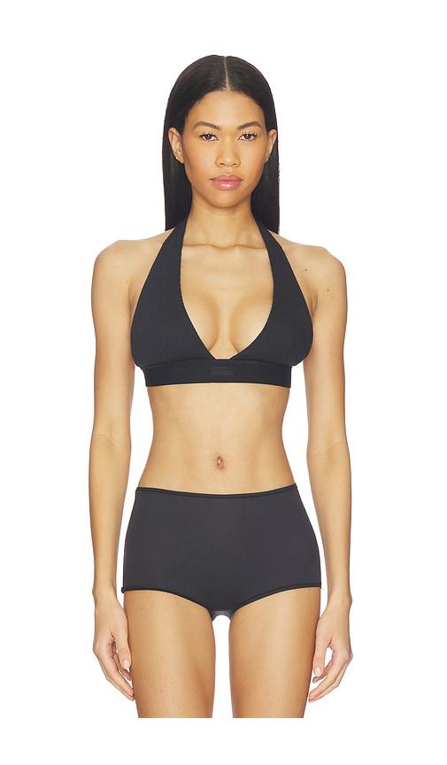 skims halter bralette in black.