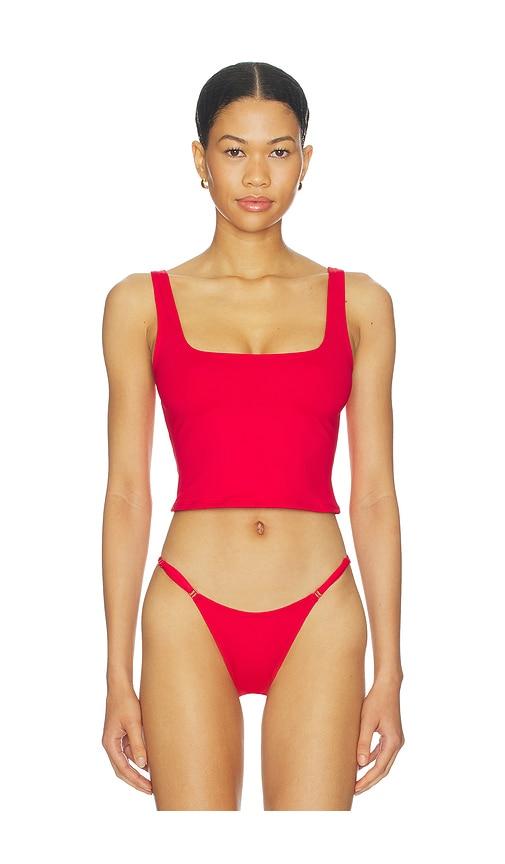 skims iconic swim tank bikini top in red.