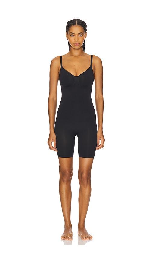 skims seamless sculpt mid thigh bodysuit in black.