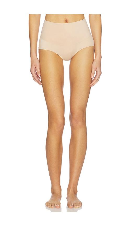 skims smoothing intimates high-waisted brief in tan.