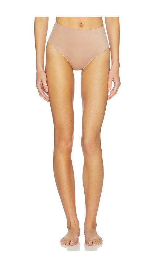 skims smoothing intimates high-waisted thong in taupe.