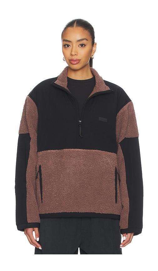 skims teddy half zip up pullover in brown.