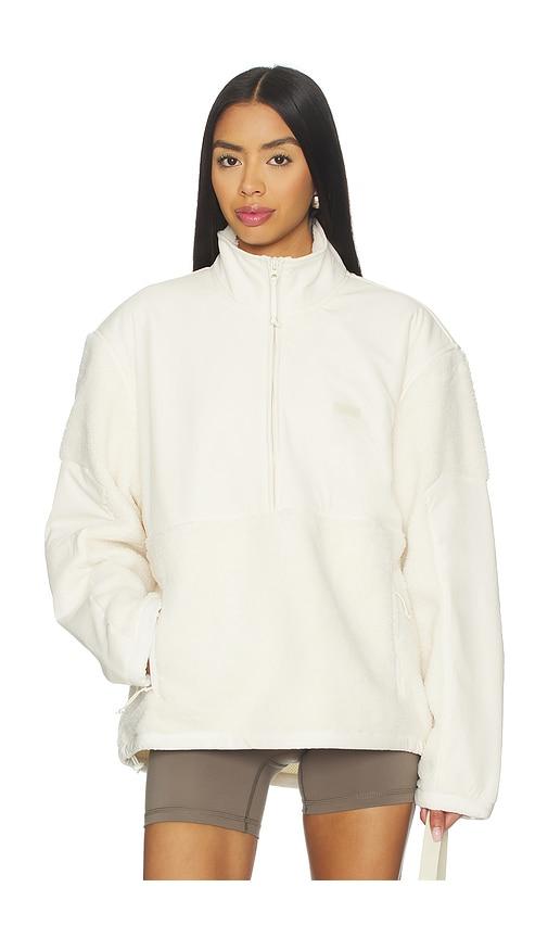 skims teddy half zip up pullover in ivory.