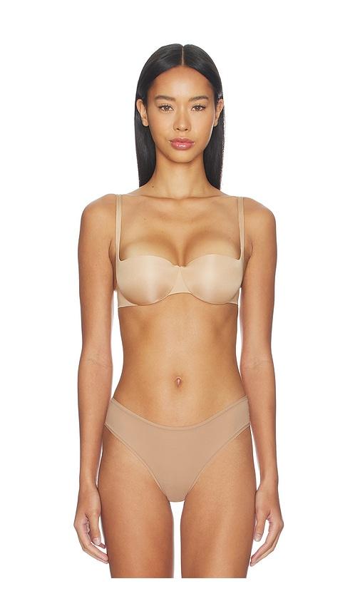 skims ultimate push-up balconette bra in nude.