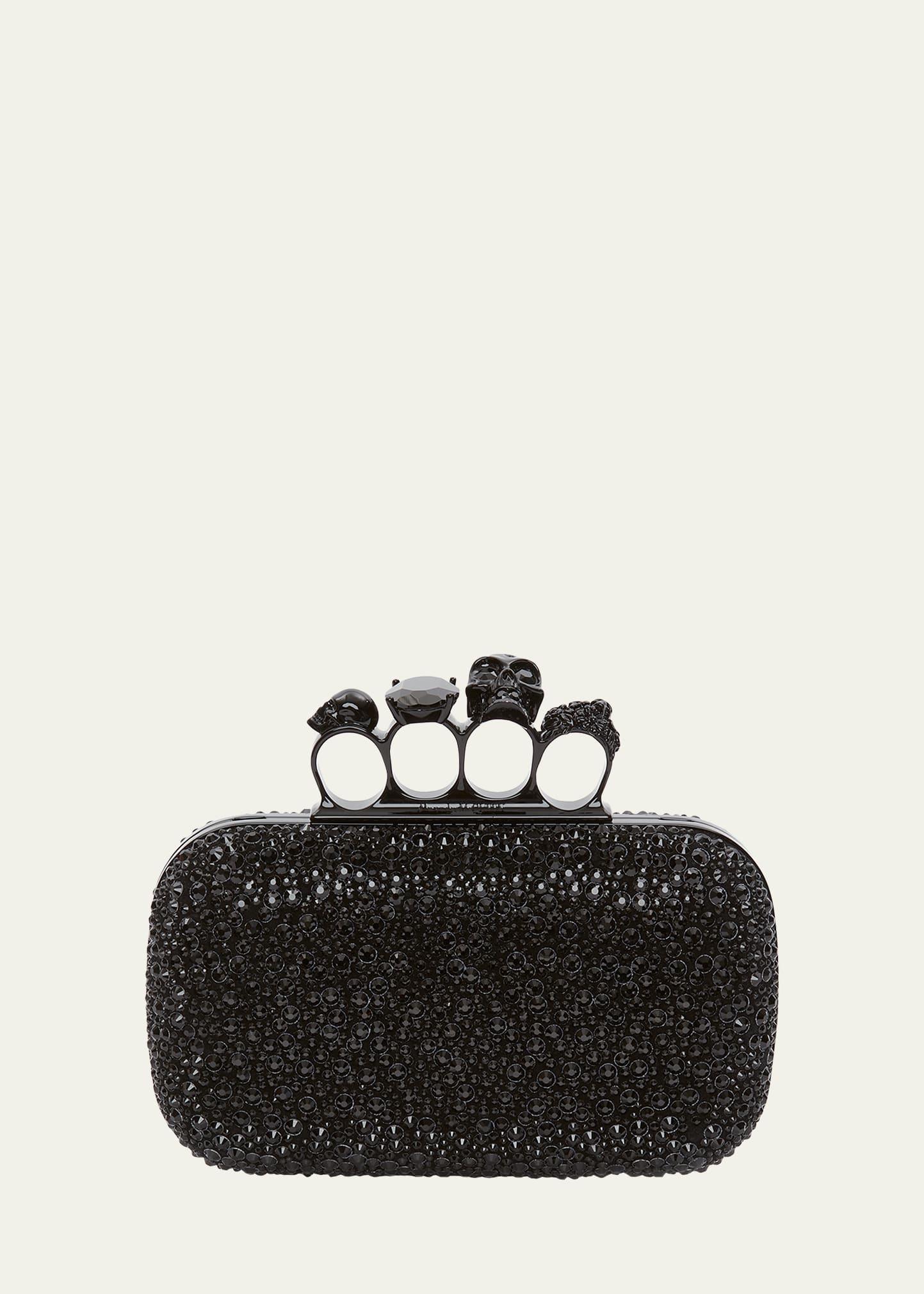 skull four-ring spike crystal clutch bag