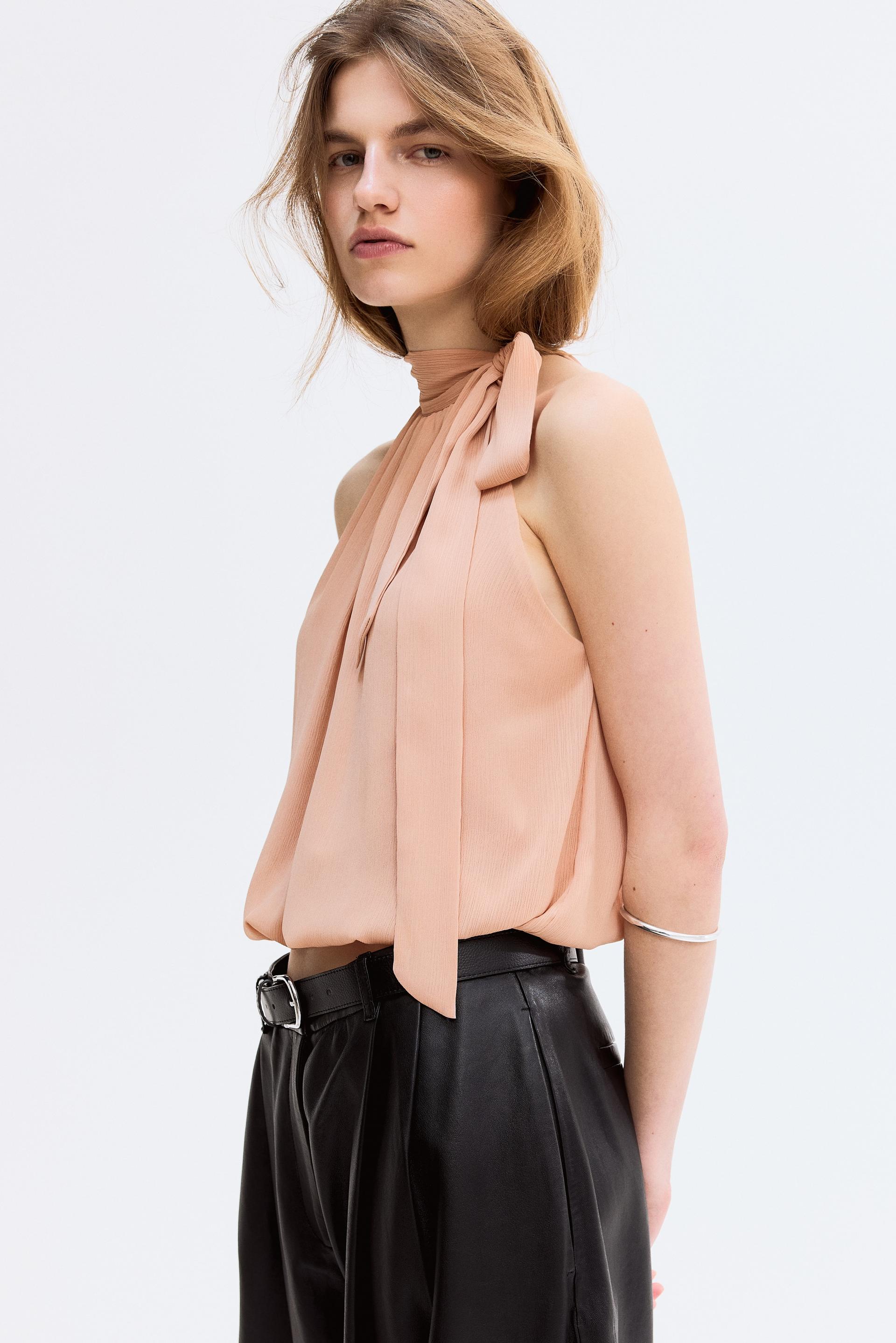 sleeveless bubble-hem top