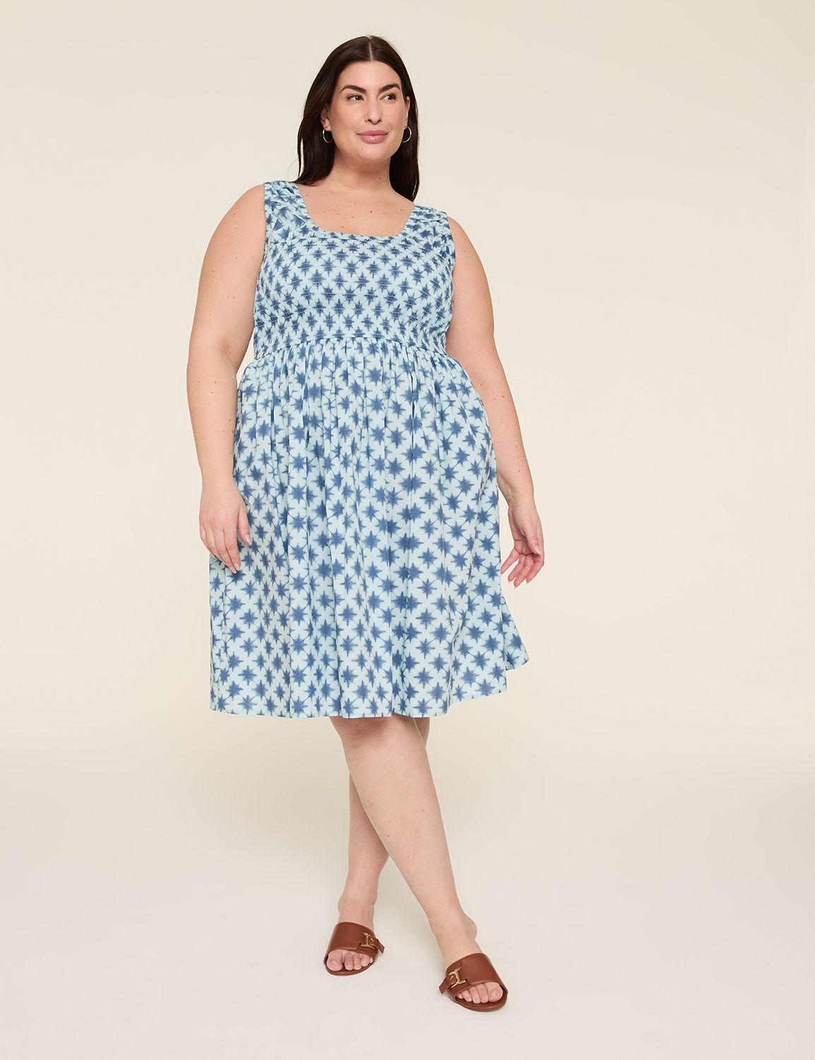 sleeveless smocked-bodice dress