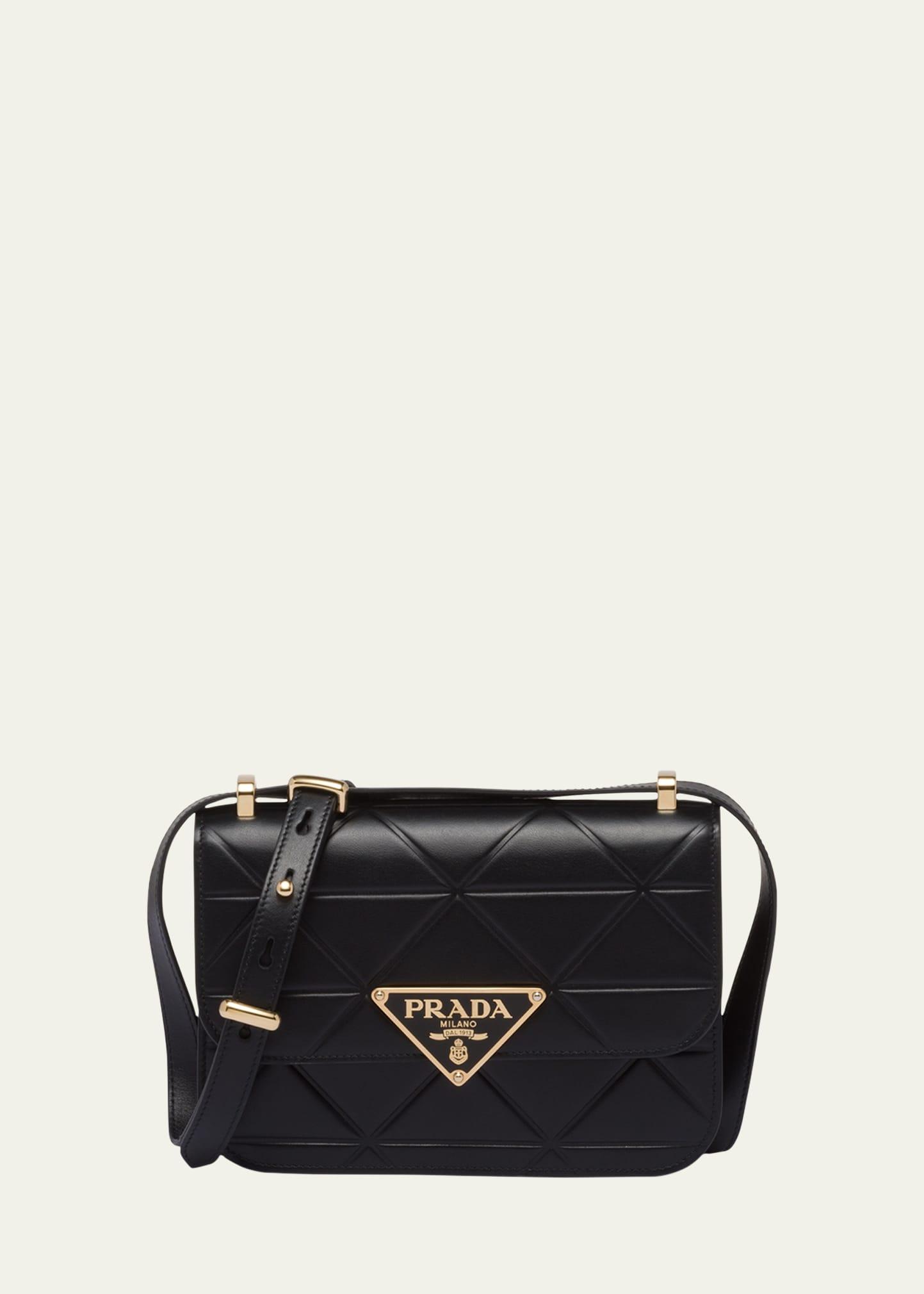small triangle quilted shoulder bag