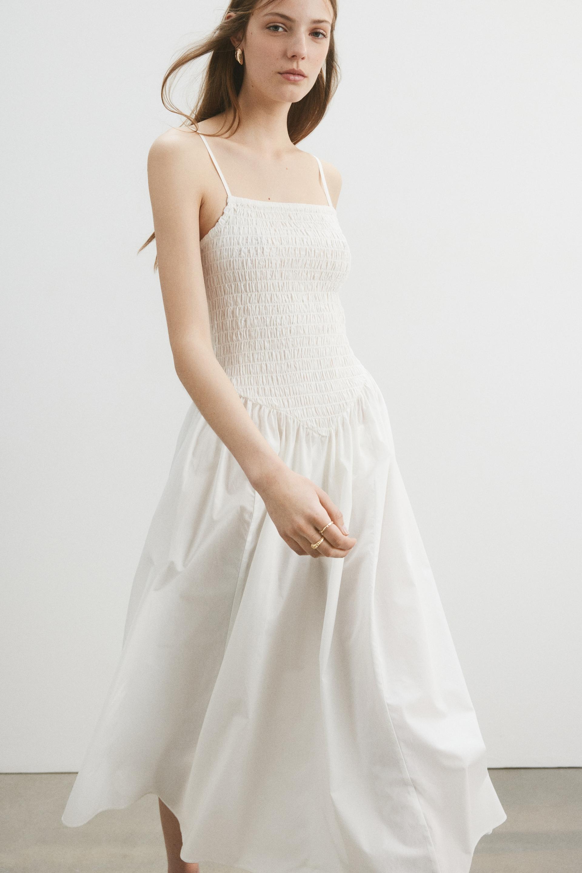 smocked dress with flared skirt