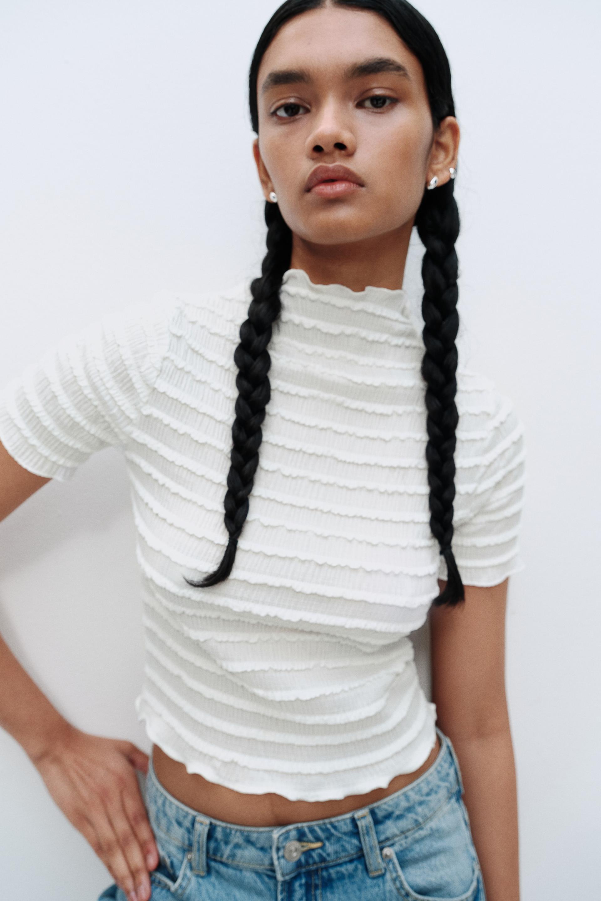 smocked top with overlocked trim