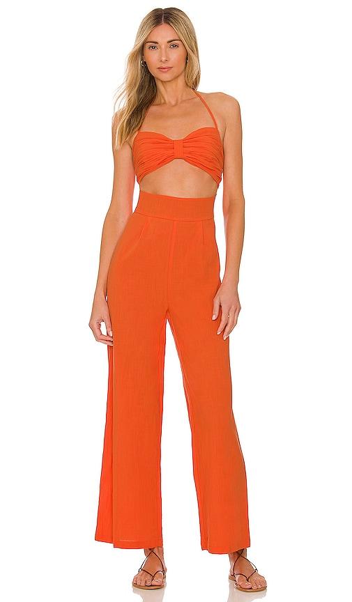 sndys x revolve boat linen jumpsuit in tangerine.