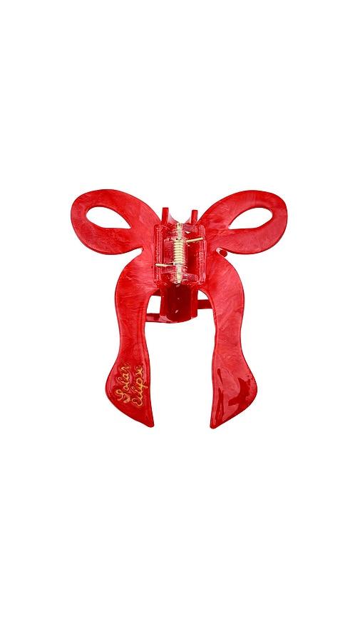 solar eclipse hand-painted coquette bow claw hair clip in red.