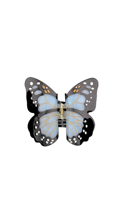 solar eclipse hand-painted monarch butterfly claw hair clip in baby blue.