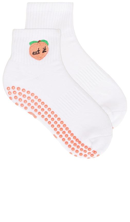 souls. peach grip socks in white.