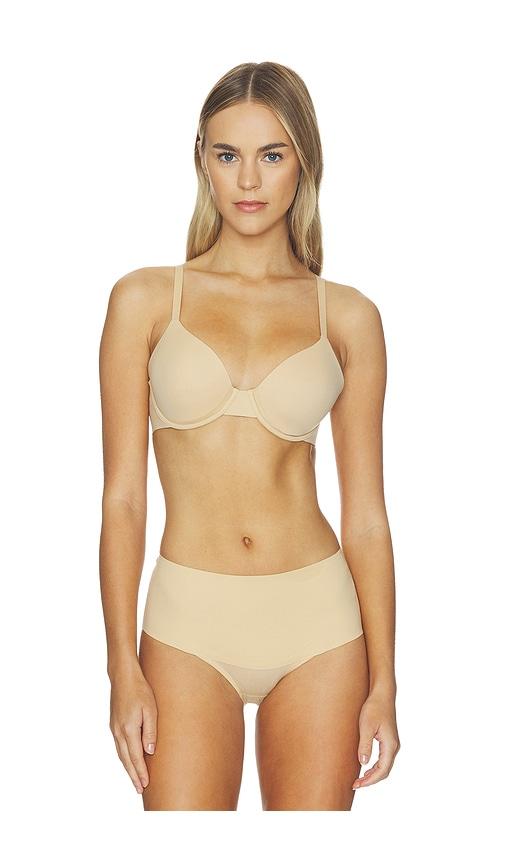 spanx supersmooth brava lightly lined bra in tan.
