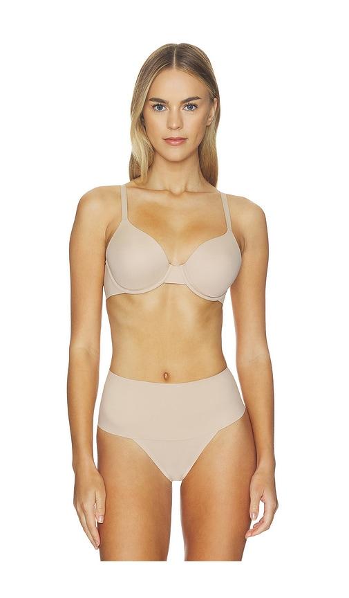 spanx supersmooth brava lightly lined bra in taupe.