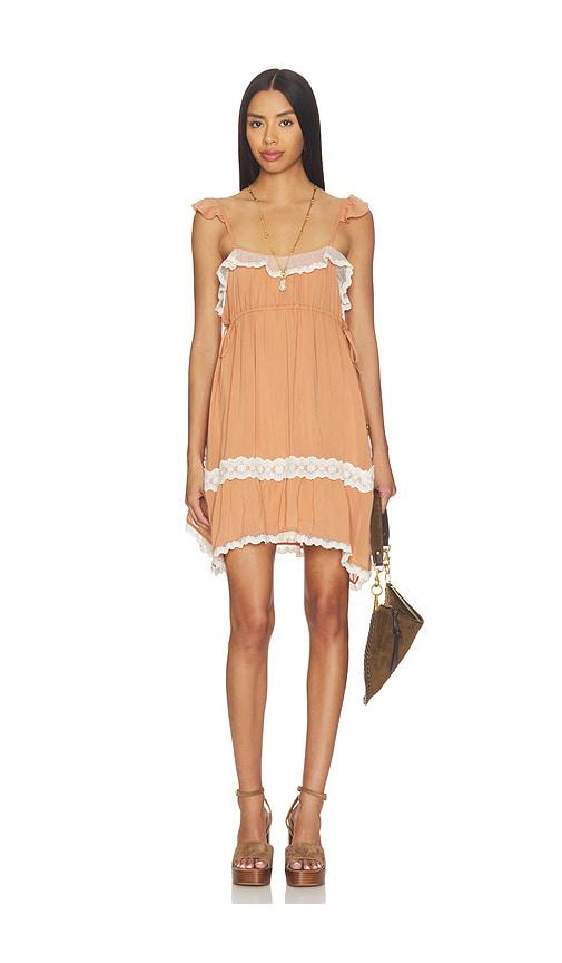 spell poison peach mini dress in peach.