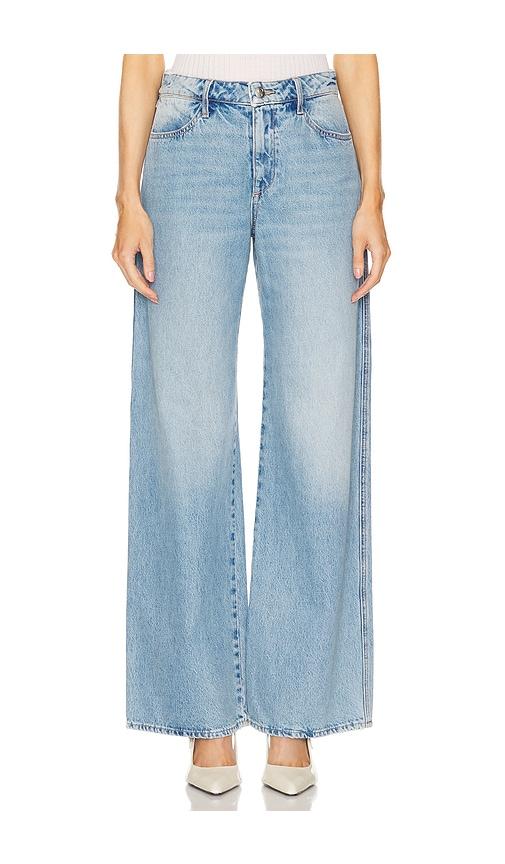 sprwmn mid rise wide leg jeans in blue.