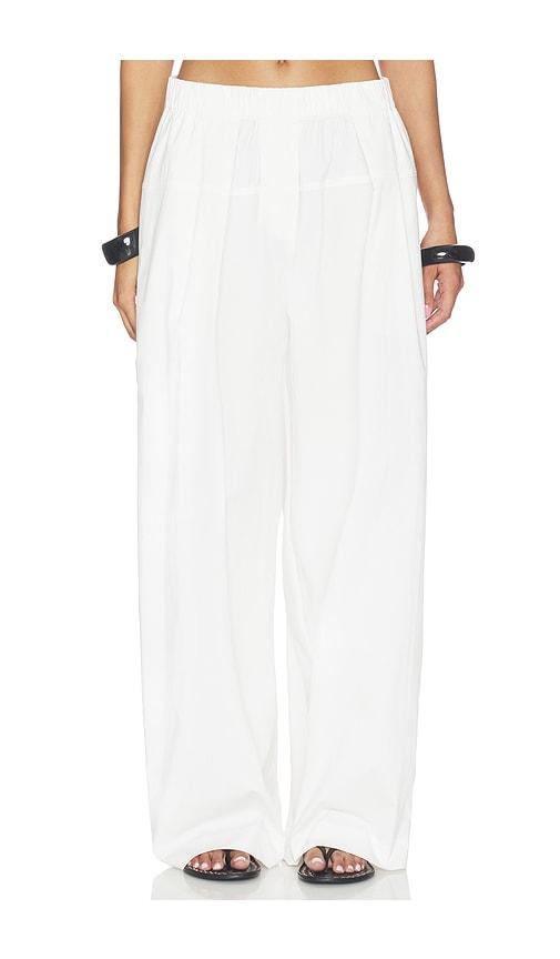 st. agni relaxed pleat pants in white.