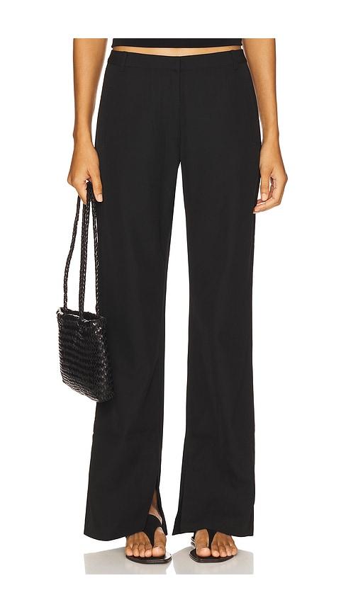 st. agni st agni 90s split leg pants in black.