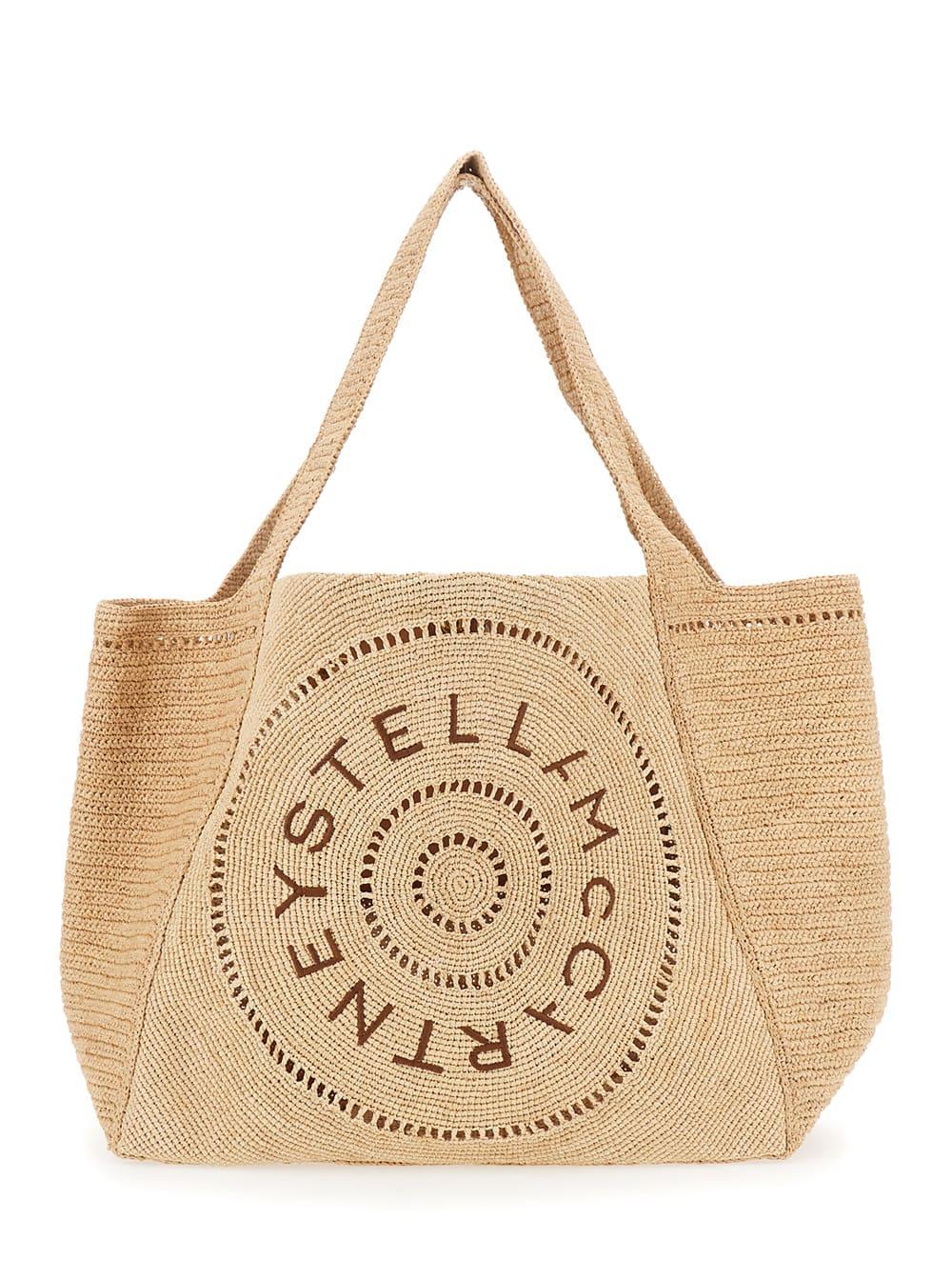 stella mccartney beige tote bag with two top handles and logo embroidery on the front in raffia woman