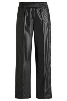 straight-leg trousers in faux leather with press-studs- black women's pants