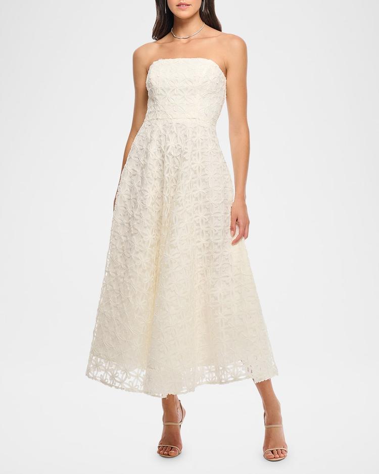 Strapless Floral Applique Maxi Dress – An ivory strapless maxi dress adorned with gauzy floral appliqués, featuring an A-line silhouette and full-length design.