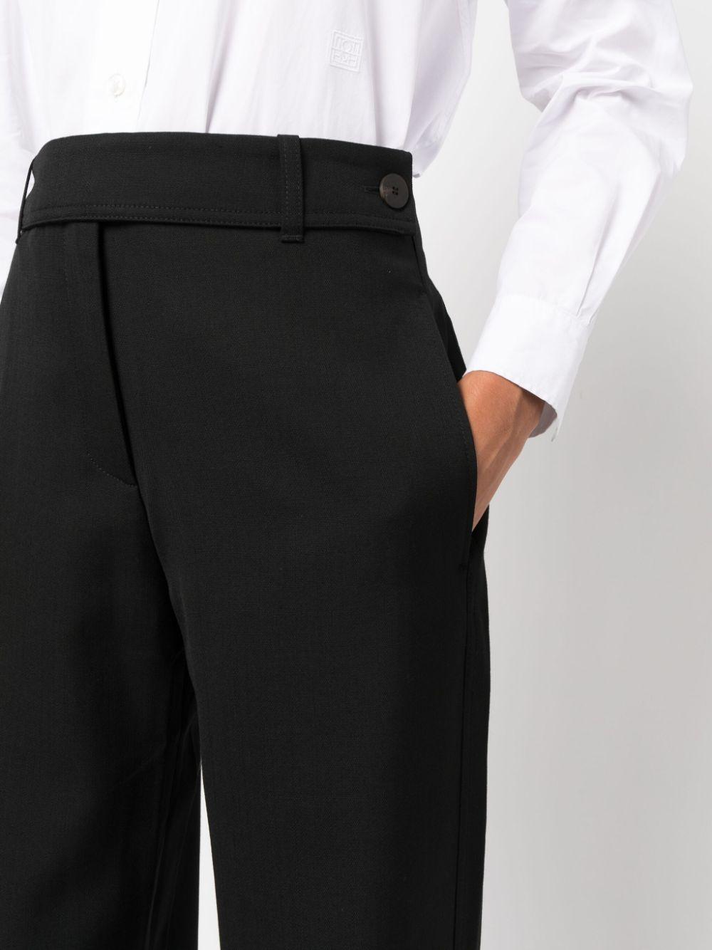 studio nicholson trousers black polyester - women