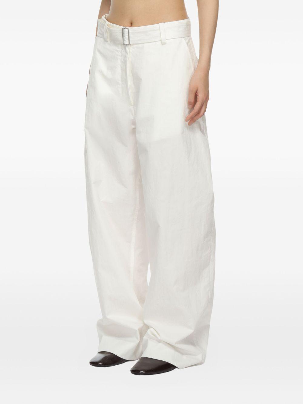 studio nicholson trousers white cotton - women