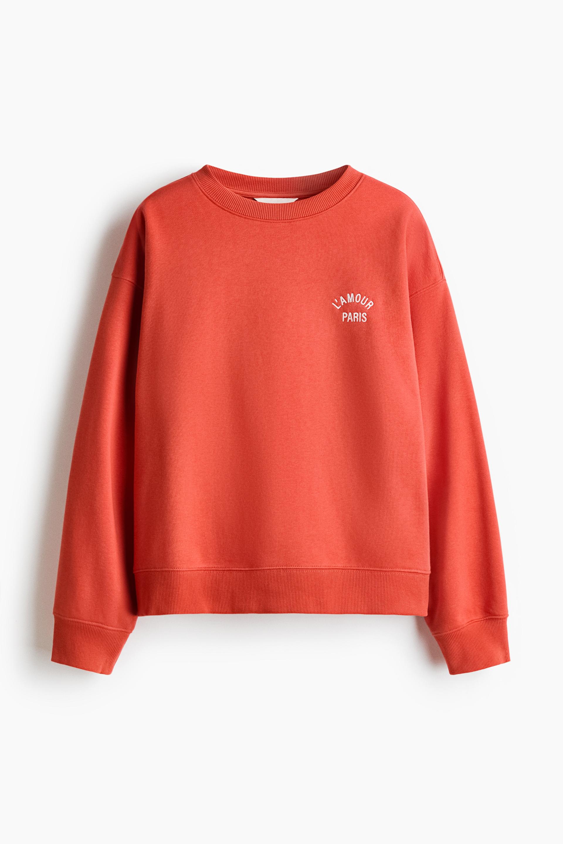 sweatshirt with text motif