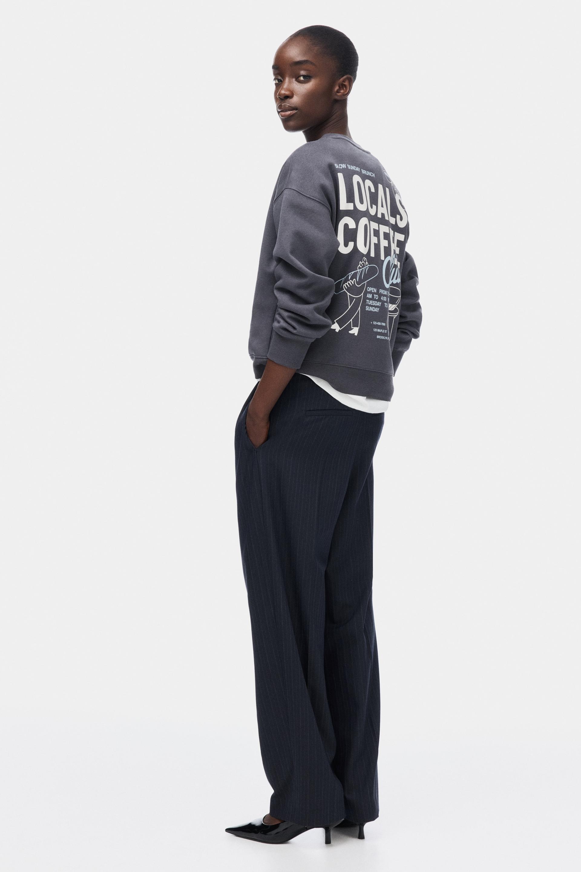 sweatshirt with text motif