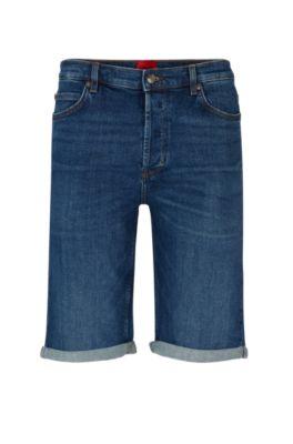 tapered-fit shorts in blue comfort-stretch denim- blue men's jeans