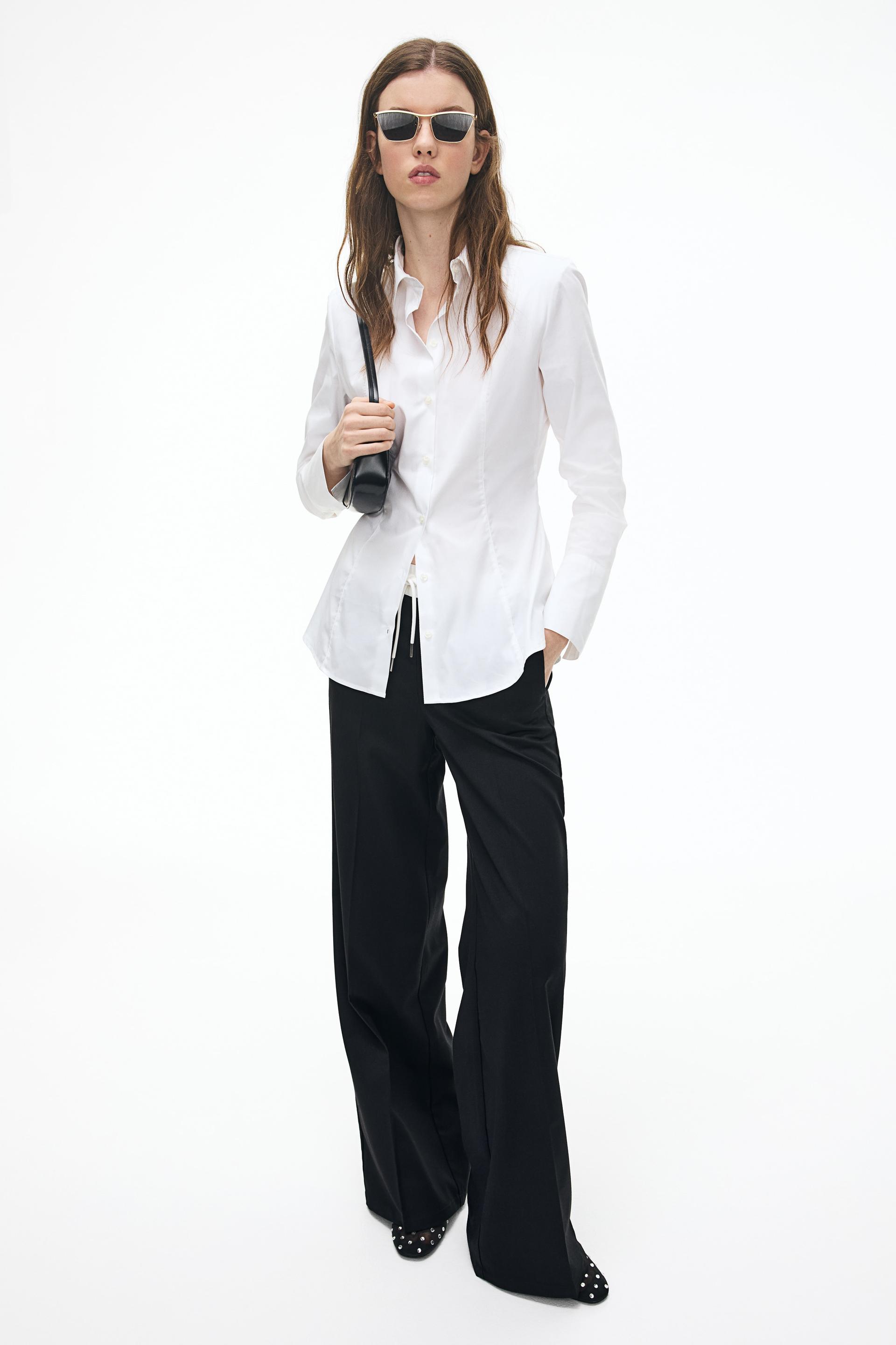 tapered-waist shirt with shoulder pads