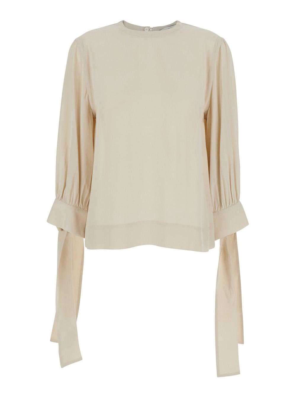 tela beige blouse with round neck and draped sleeves in fabric woman