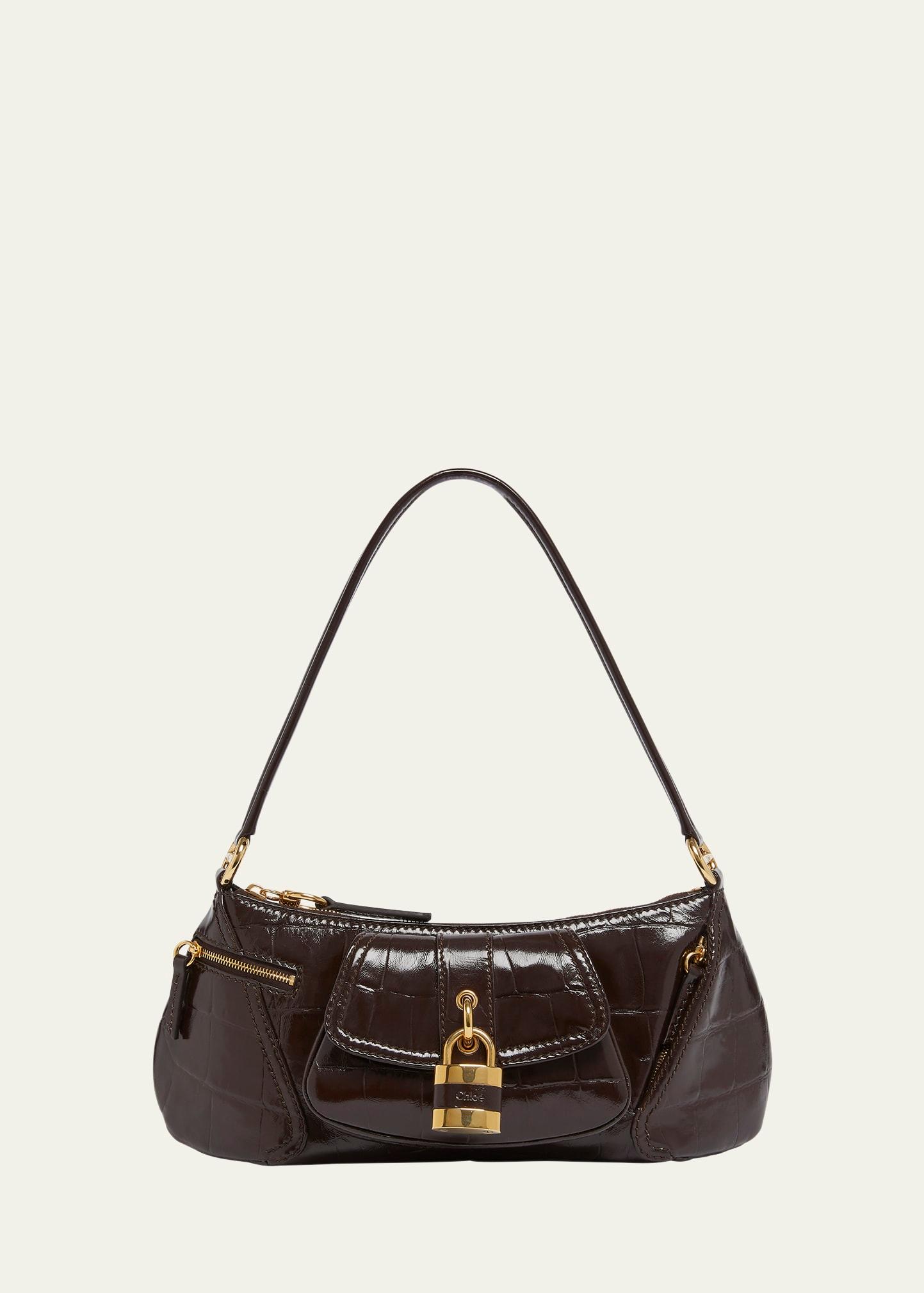 the 99 shoulder bag in croc-embossed calfskin