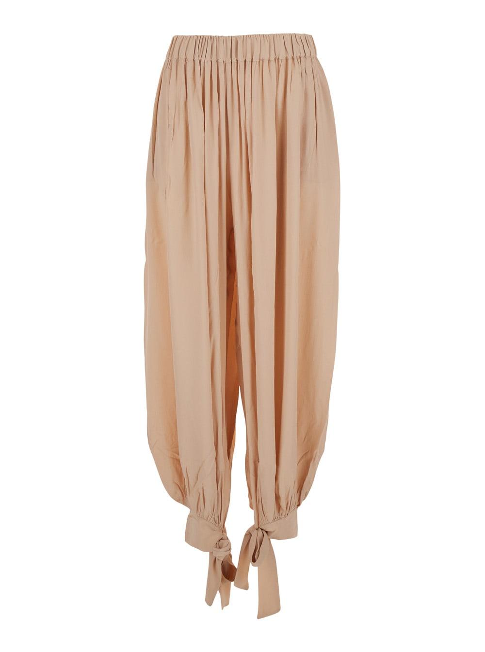 the andamane noor pink pants with bow at waist in womens fabric