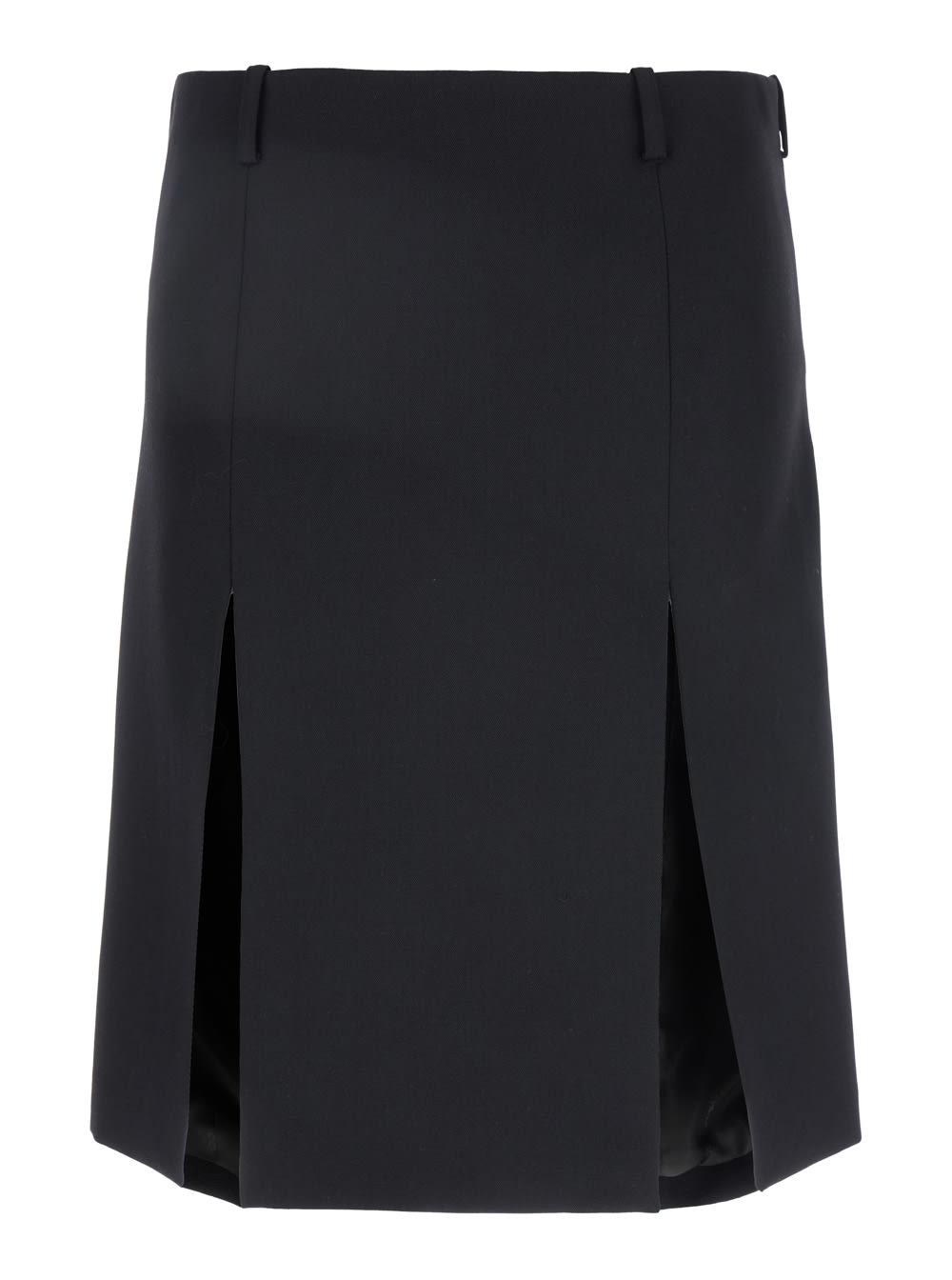 the attico black skirt with two front slits and logo plaque on the rear in wool woman
