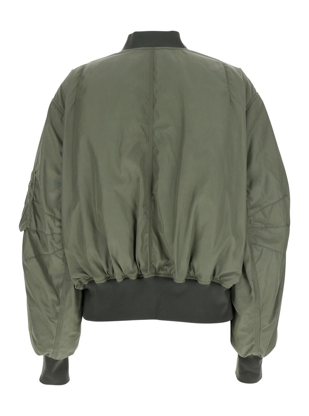 the attico green bomber jacket with zip pocket on the sleeve in tech fabric woman