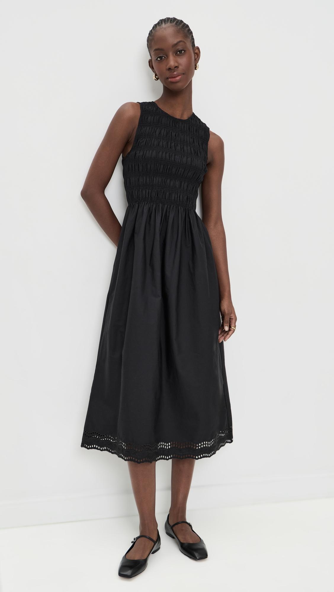 the embroidered melody smocked midi dress