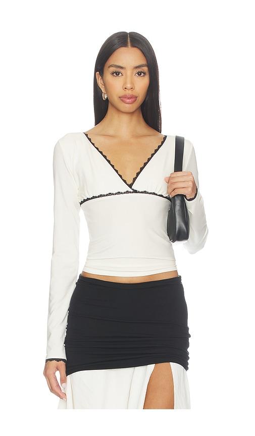 the line by k axel top in cream.