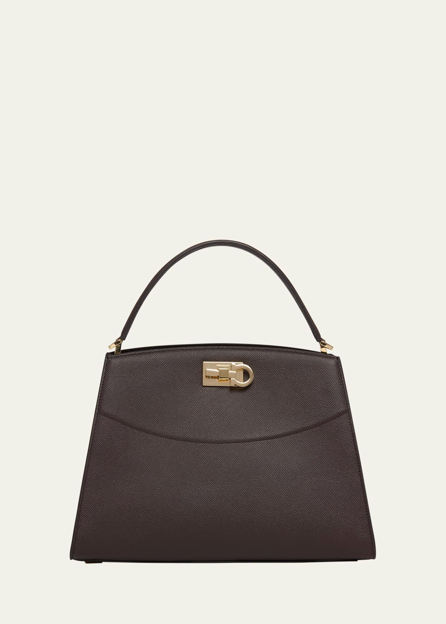 the new studio box leather top-handle bag